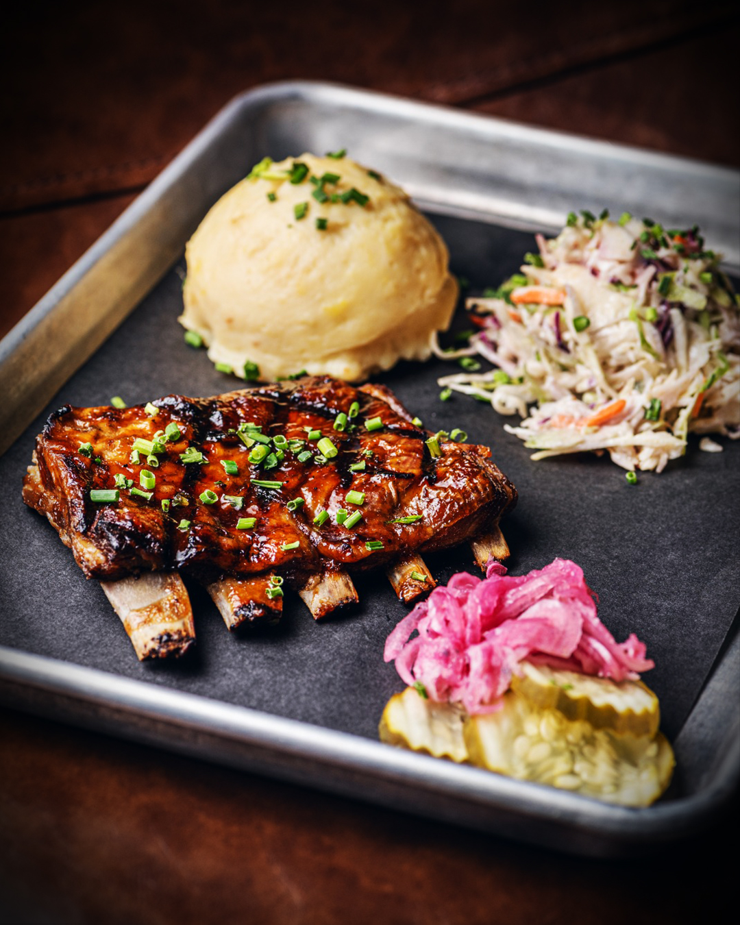 Smoky, saucy, and straight-up irresistible 🤤🔥 These Lamb Ribs from Mad Ox BBQ…